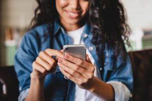 young woman on her phone.